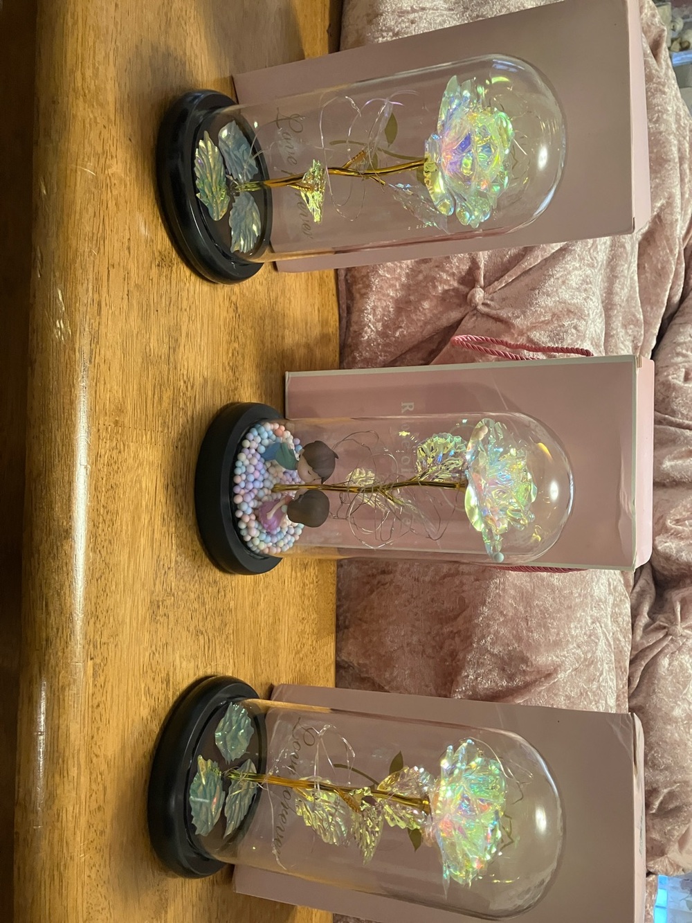 New.  Set of 3. Glass encased roses which lite up ( all new batteries )